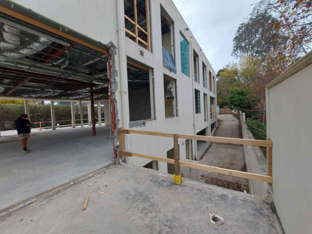 commercial building with exposed steel frame structure and concrete construction in Melbourne